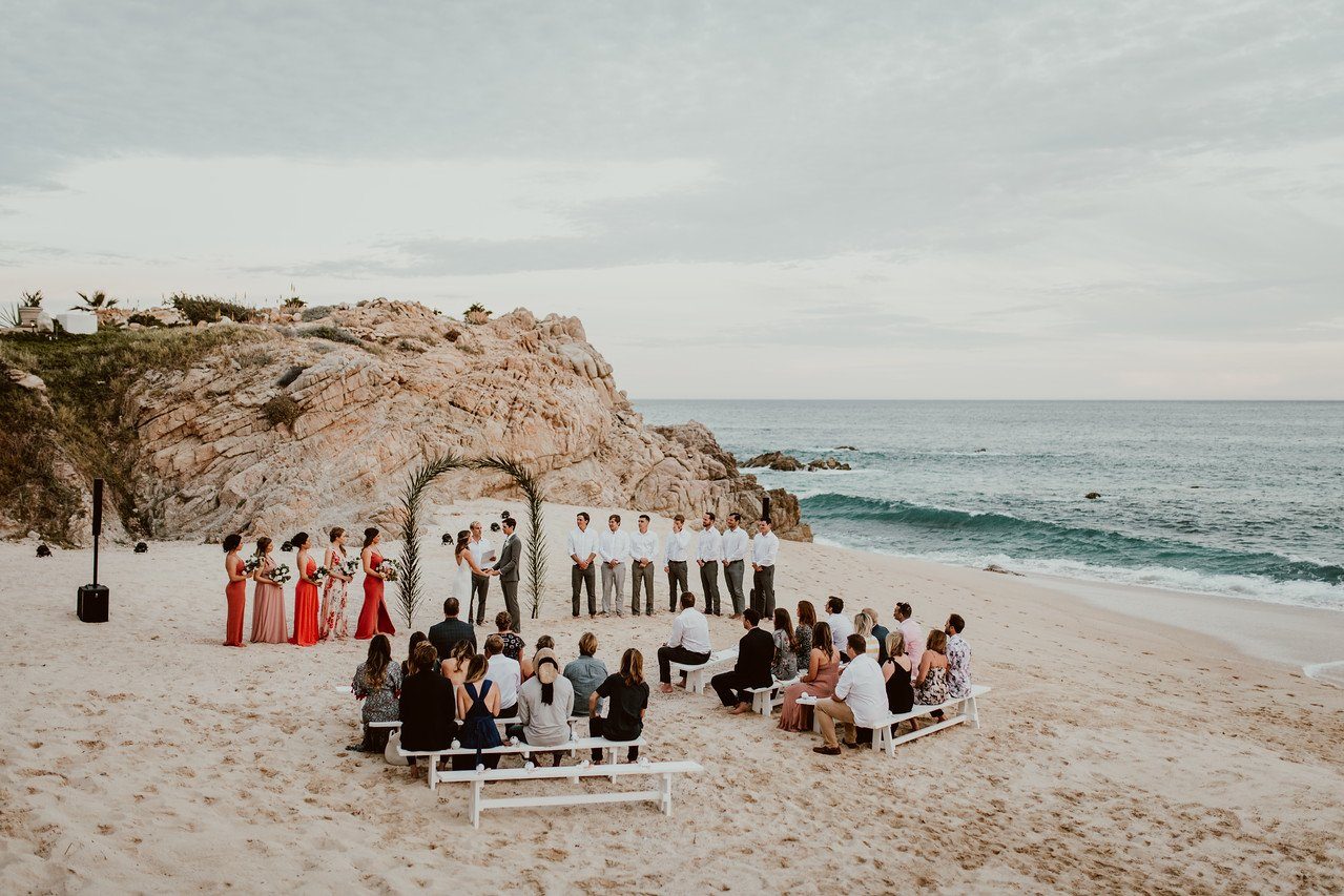 Wedding ceremony with guests on the beach