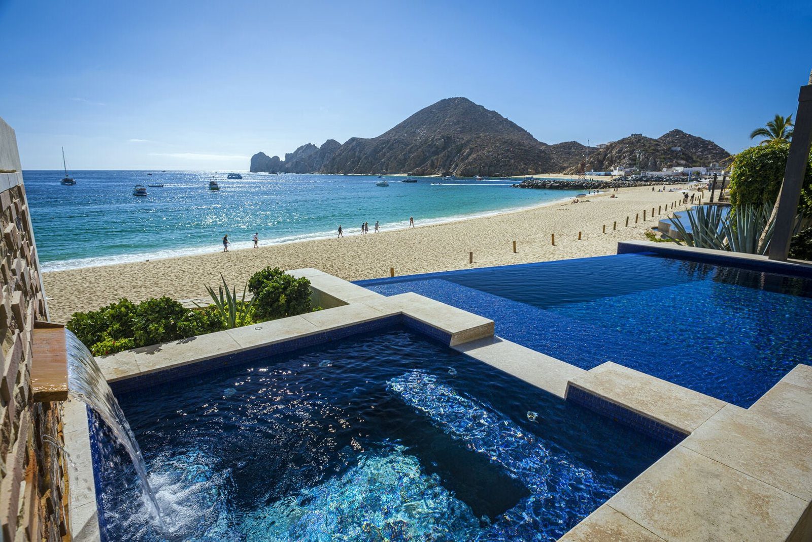Villa Marena infinity pool overlooking Medano Beach and the Cabo Arch